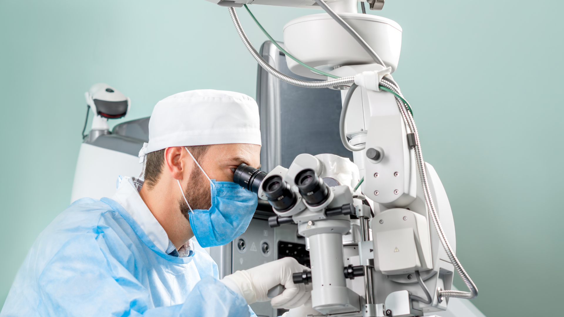 Eye doctor examining patient with medical microscope equipment